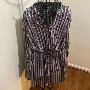 Beautiful swing dress with side pockets. Light weight and stylish.